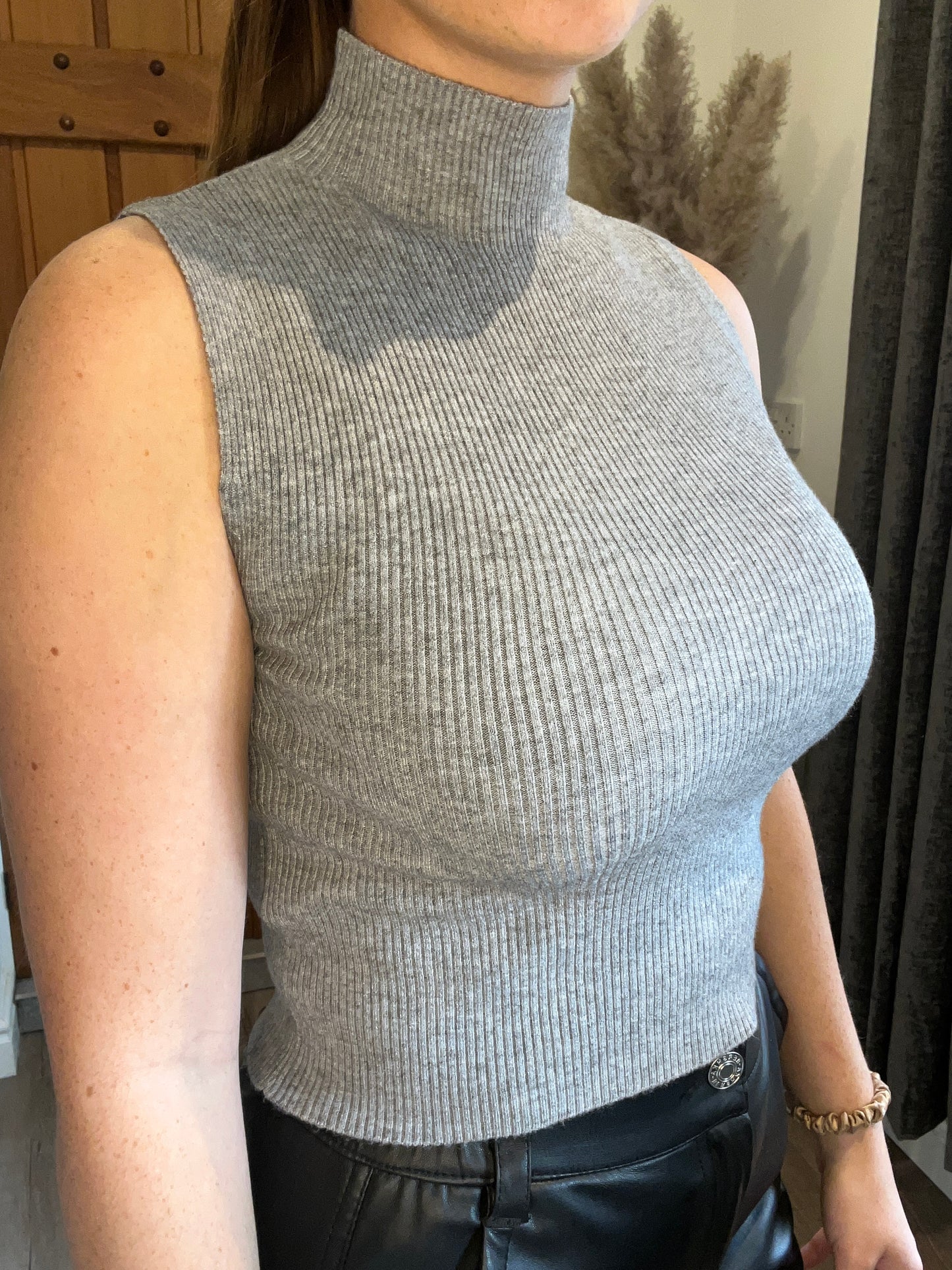 Grey sleeveless high neck top