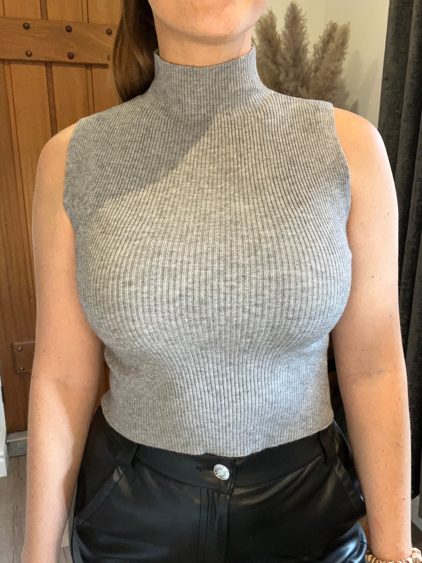 Grey sleeveless high neck top